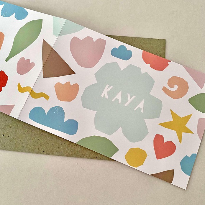 Geboortekaartje met geknipte vormen